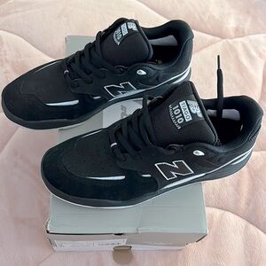 Men’s New Balance Tiago 1010 sneakers in black size 9